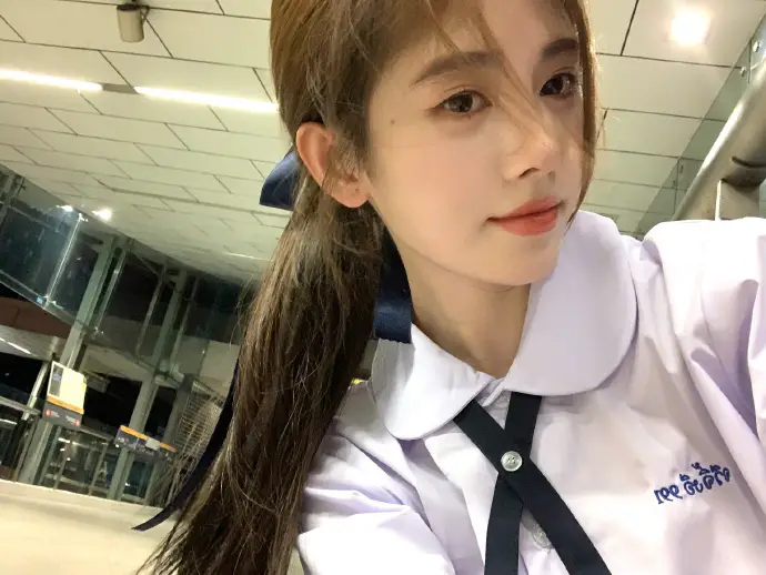 Ju Jingyi Taking Photos in a Thai School Uniform: Breaking the Law or ...