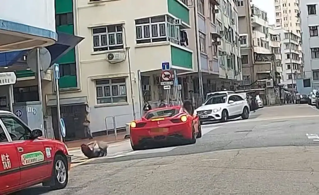 193 accidentally knocked down a pedestrian while reversing his Ferrari.