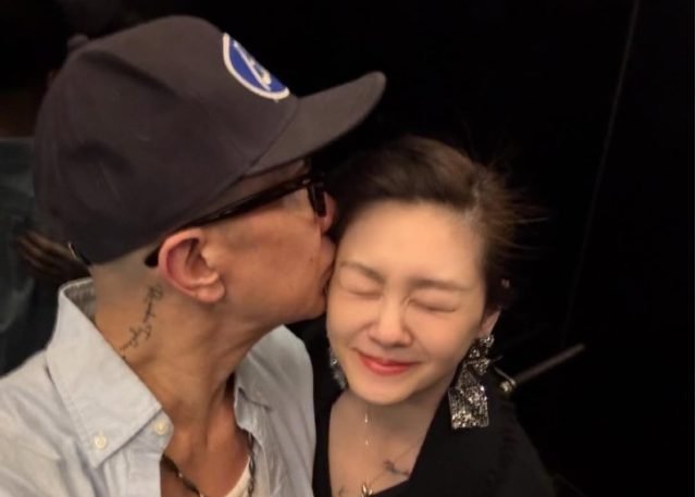 Barbie Hsu's Husband DJ Koo presses a kiss on her temple